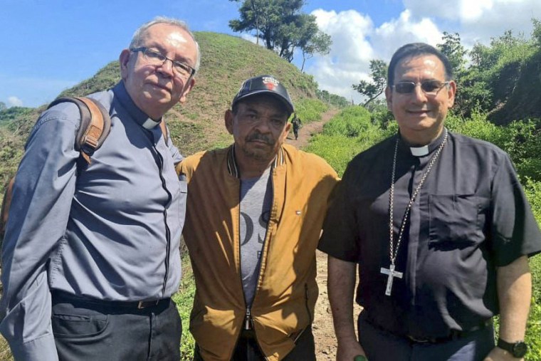 Priests Hector Henao, left, and Francisco Ceballos pose with Luis Manuel Diaz after his release in Valledupar, Colombia on Nov. 9 , 2023. 