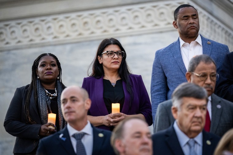Rep. Rashida Tlaib, D-Mich., center, attends a vigil for the victims of the Oct. 7 Hamas attack in Israel outside the Capitol.
