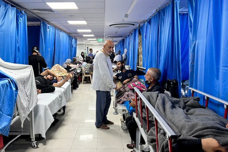 Patients and internally displaced people at Al-Shifa hospital in Gaza City.