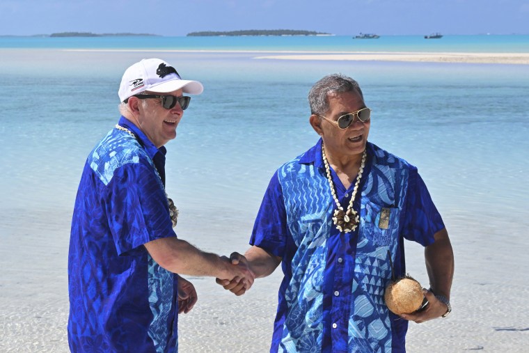  Australia on Friday offered the island nation of Tuvalu a lifeline to help residents escape the rising seas and increased storms that climate change is bringing. (Mick Tsikas/AAP Image via AP)