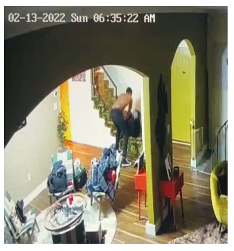 A screenshot from home surveillance footage showing Darius Jackson allegedly choking and body slamming Keke Palmer in her home on Feb. 13, 2022.