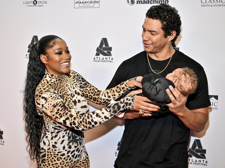 Keke Palmer, Darius Jackson and their son Leo Jackson in Atlanta on April 29, 2023. 