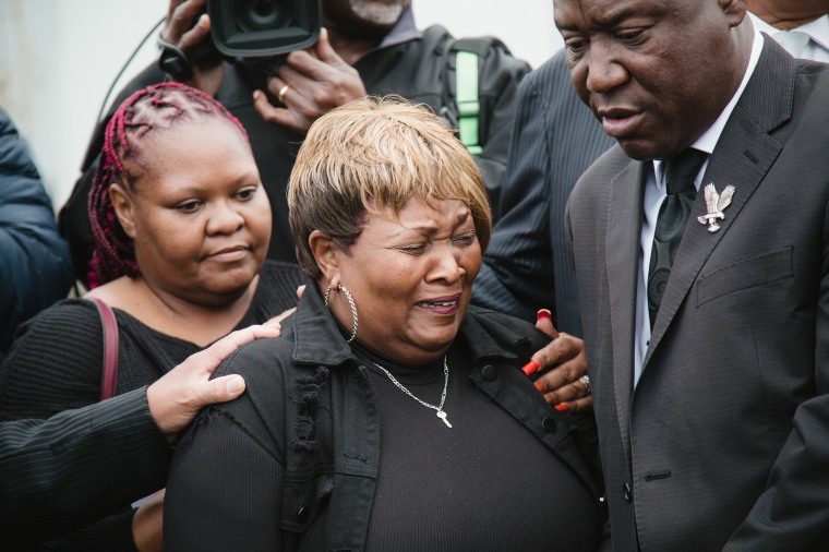 Bettersten Wade and attorney Benjamin Crump at the exhumation of her son, Dexter Wade.