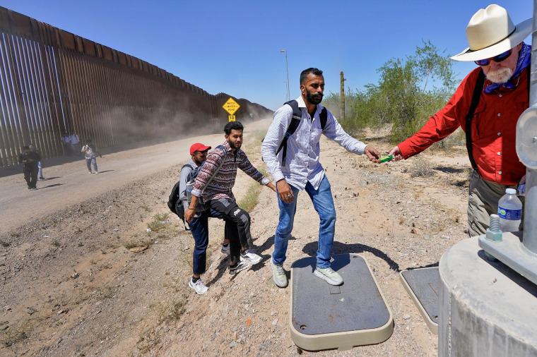 A group of migrants from India at the U.S.-Mexico border in Lukeville, Ariz. on Aug. 29, 2023. 