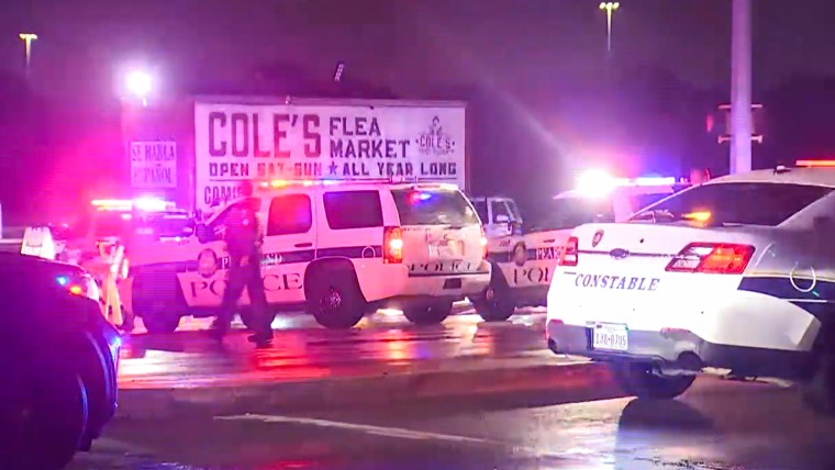 Police respond to a shooting at a flea market in Pearland, Texas.