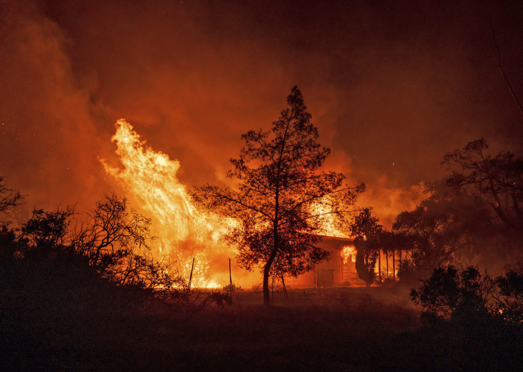 A structure is engulfed in flames as a wildfire called the Highland Fire burns in Aguanga, Calif., on Oct. 30, 2023. 
