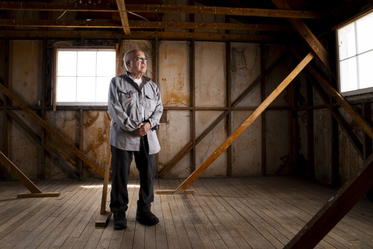 Paul Tomita in a historic barracks at Minidoka National Historic Site in Jerome, Idaho