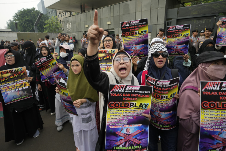 Muslims shout slogans during a rally against the British band Coldplay outside the British embassy in Jakarta on Nov. 10, 2023. 