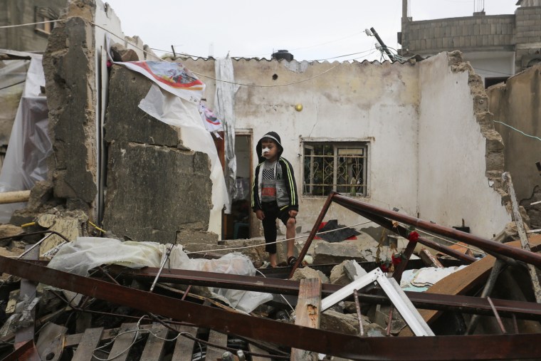 A boy stands amid the destruction after Israeli strikes in Rafah, Gaza Strip, Wednesday, Nov. 15, 2023. Image: