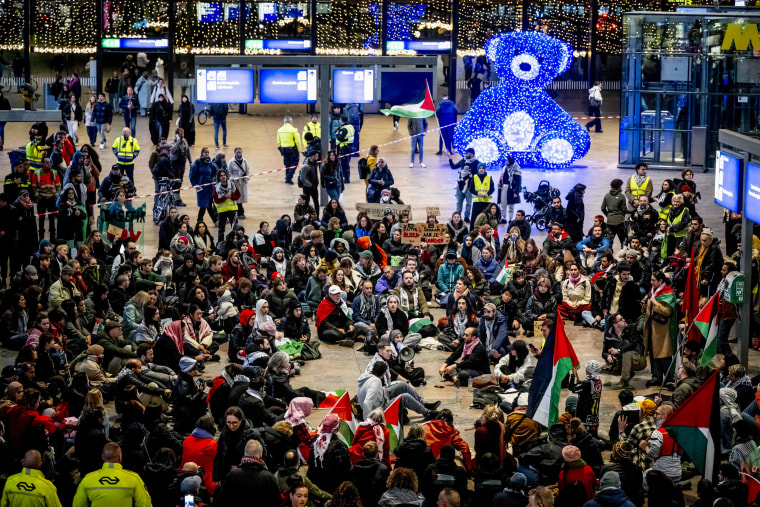 Protesters hold a sit-in at Rotterdam Centraal Station in Rotterdam.