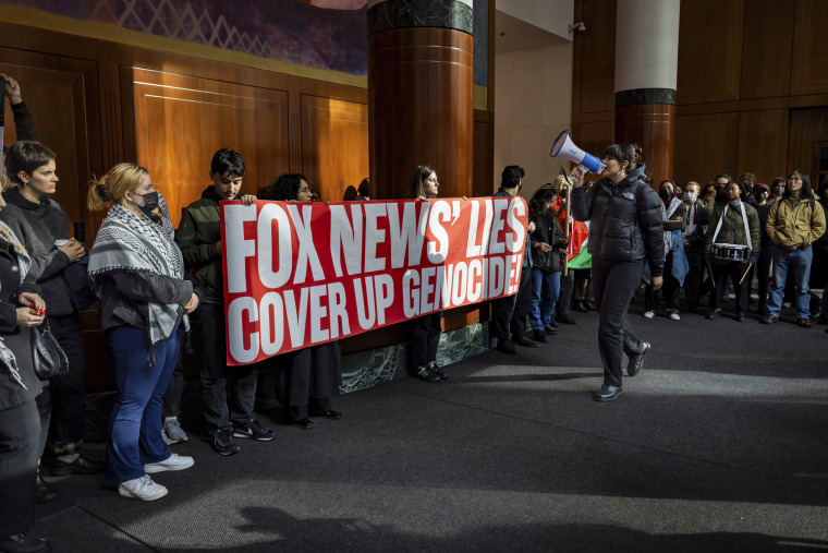 Protesters takeover the lobby of News Corp headquarters during a demonstration calling for a ceasefire in Gaza on Nov. 17, 2023 in New York.