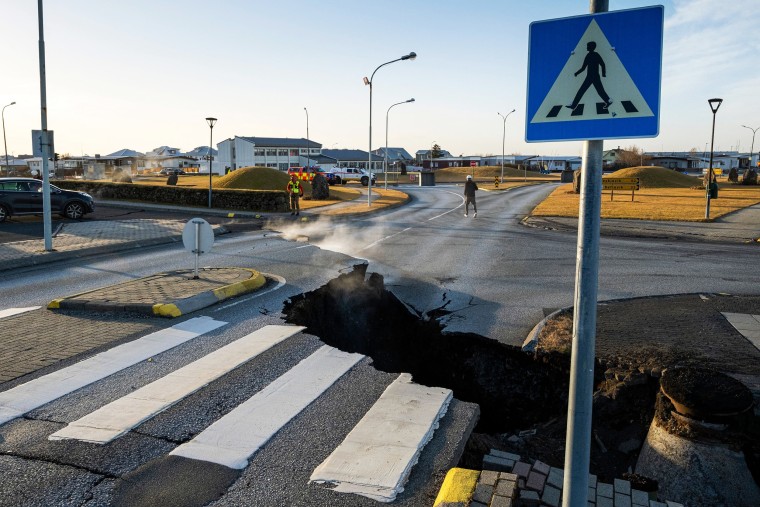 A large crack opened up across the main road in Grindavik, southwestern Iceland, on Monday.