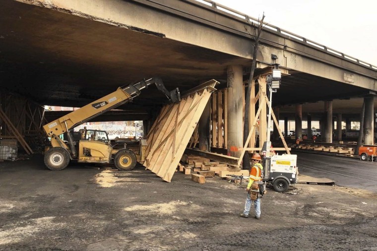 Image:The area under the freeway that burned last weekend, damaging a section of a key thoroughfare in the car-dependent city, was stacked with flammable materials on lots leased by the state through a little-known program that now is under scrutiny. 