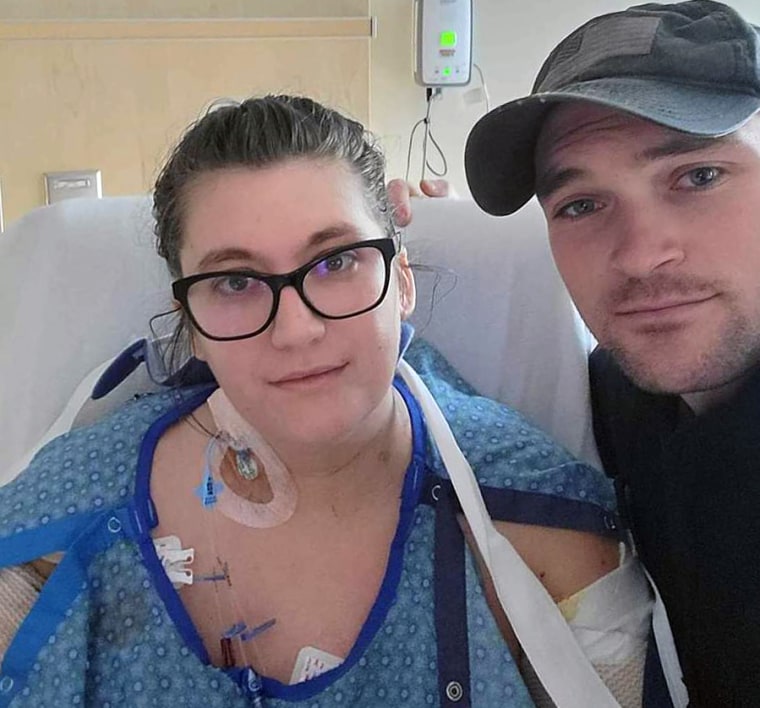 Image: Ashtin Gamblin and her husband at the hospital