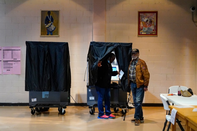 A voter leaves a booth after casting their ballot on election day in Philadelphia