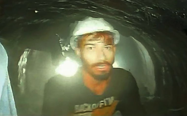 A worker trapped inside the  collapsed tunnel in India's Uttarakhand state in an image captured by an endoscopic camera on Nov. 21, 2023. 