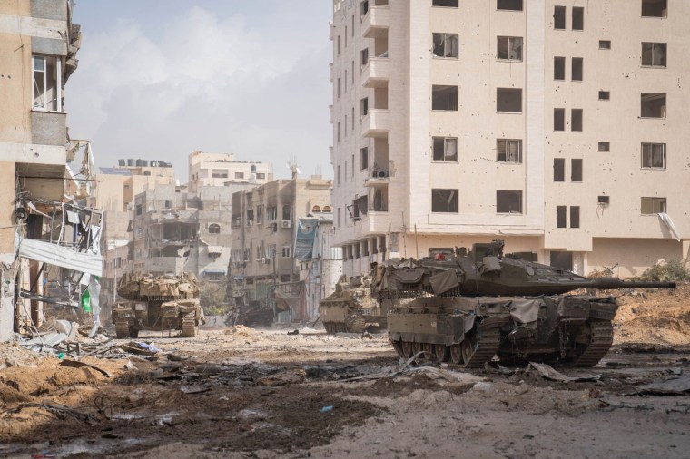 Israeli tanks operate in a location given as Gaza, amid the ongoing ground operation of the Israeli army against the Palestinian Islamist group Hamas