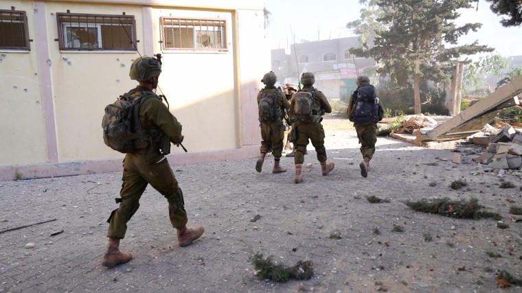 Israeli soldiers operate in an undisclosed location in Gaza in an image released on Nov. 21, 2023. 