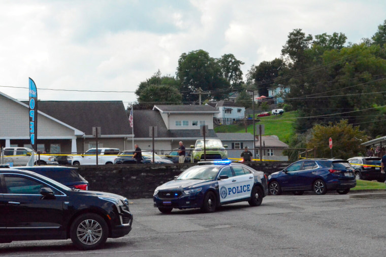 Police at a funeral home in Nutter Fort, W.Va., after Jason Owens was shot on Aug. 24, 2022.  