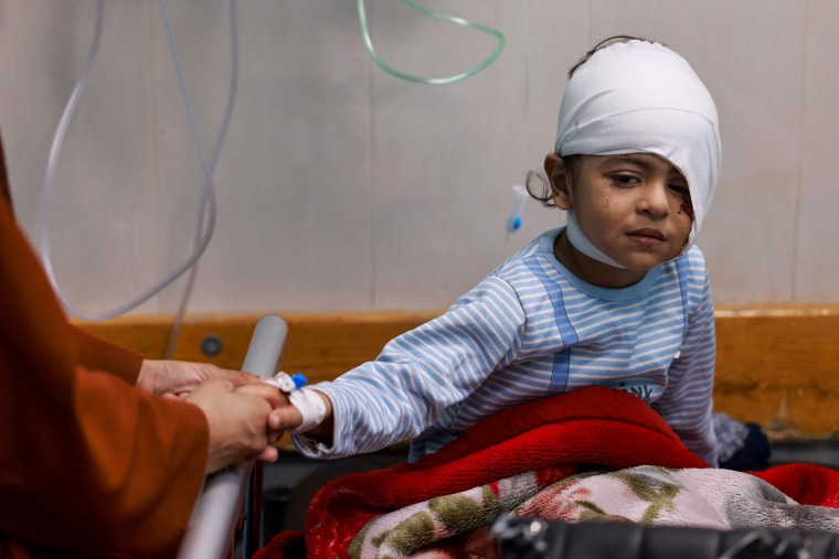 A wounded Palestinian child from the Jabalia refugee camp after being transferred from the Indonesian Hospital in northern Gaza to the Naser Hospital in Khan Younis, on Nov. 21, 2023