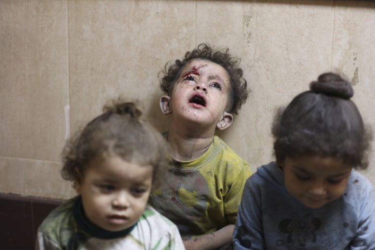 Wounded Palestinian children are treated at al-Aqsa Hospital in Deir al Balah, Gaza, Tuesday, Nov. 21, 2023.