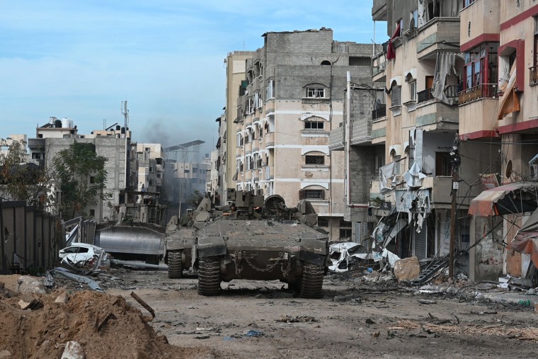 Israeli military vehicles during a military operation in the northern Gaza Strip on Nov. 22, 2023. 