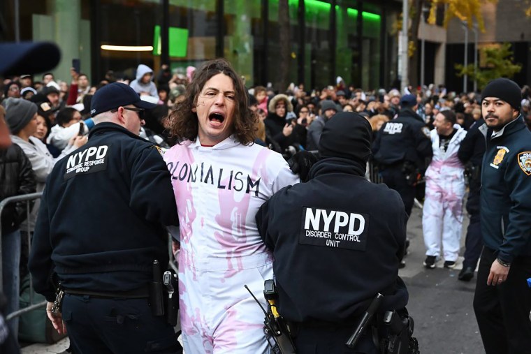 Police arrest pro-Palestinian protesters in New York City during Thanksgiving Day parade