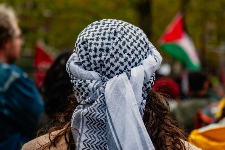 Image: A view from behind of a woman wearing the traditional