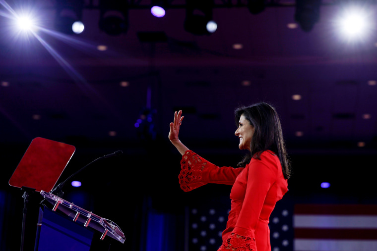Nikki Haley waves during the annual Conservative Political Action Conference.
