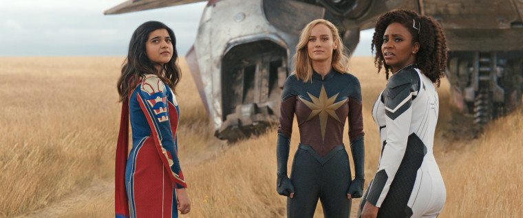 From left, Iman Vellani, Brie Larson and Carol Danvers in "The Marvels."
