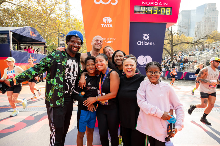 Sheinelle Jones with her family after finishing the NYC Marathon