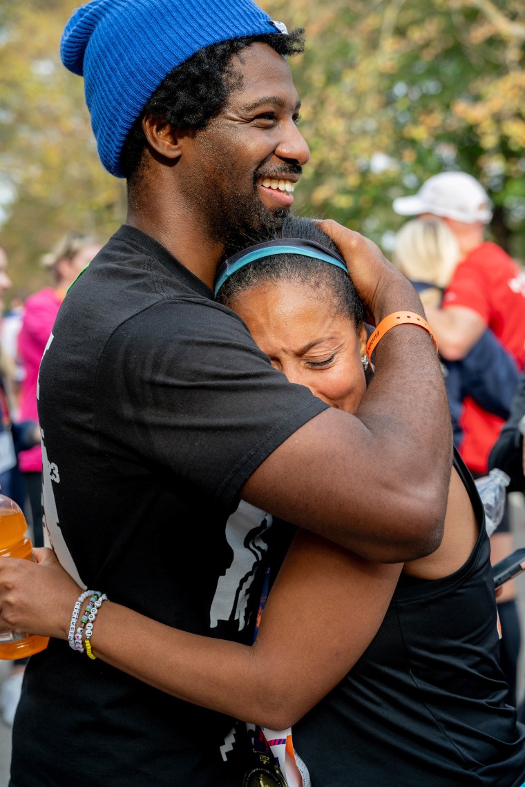 Sheinelle Jones with her husband after finishing the NYC Marathon