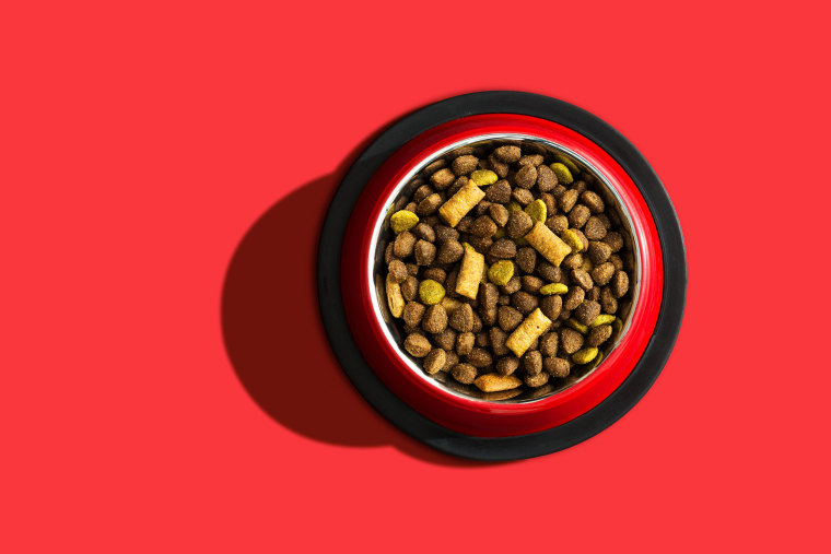 Pet food over a red background