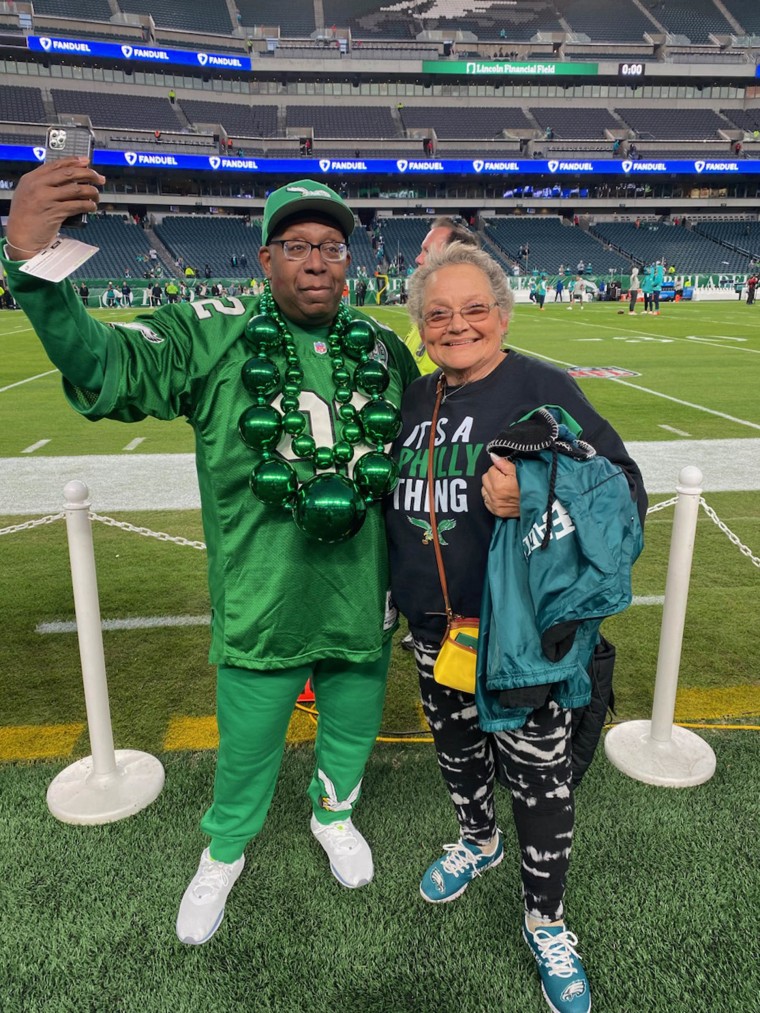 Marie Nee and Terrence Speights on the Eagles sidelines