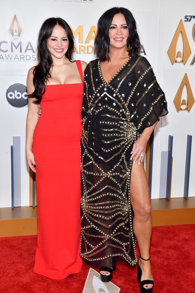 Olivia Evans and Sara Evans attend the 57th Annual CMA Awards