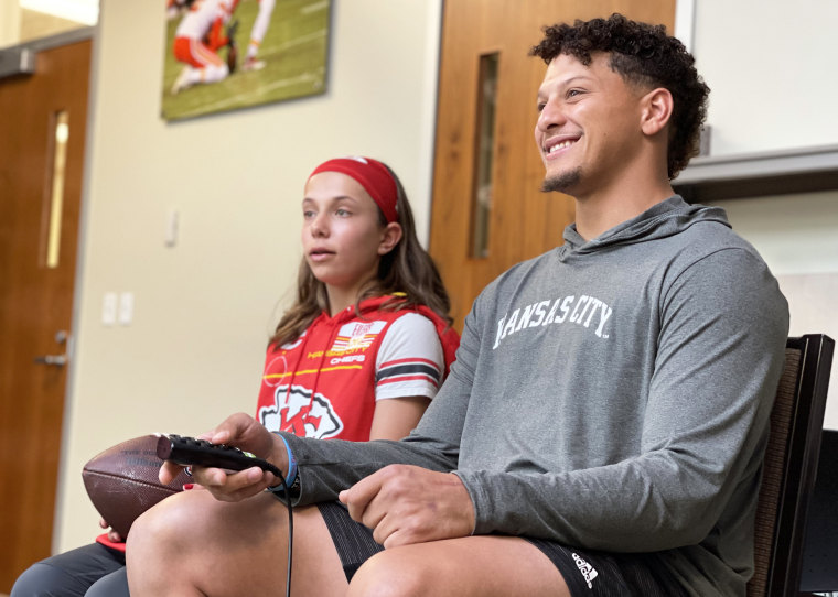 Myka Eilers and Kansas City Chiefs quarterback Patrick Mahomes review game footage together in Kansas City, Missouri in 2022.