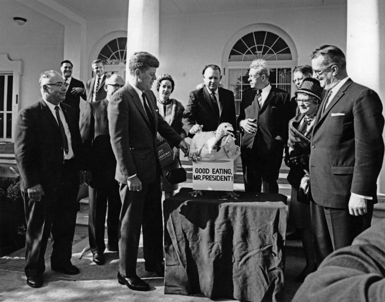 John Kennedy, pardoning of the turkey at the White House.