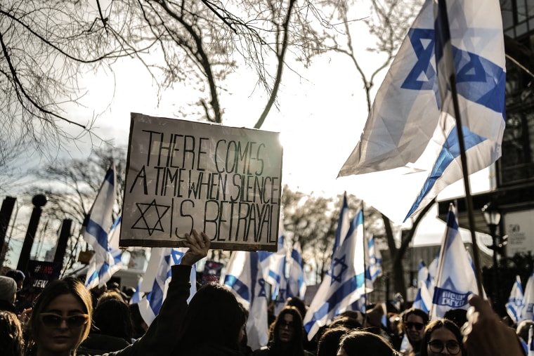 Image: Demonstrators gather during a protest outside of United Nations headquarters