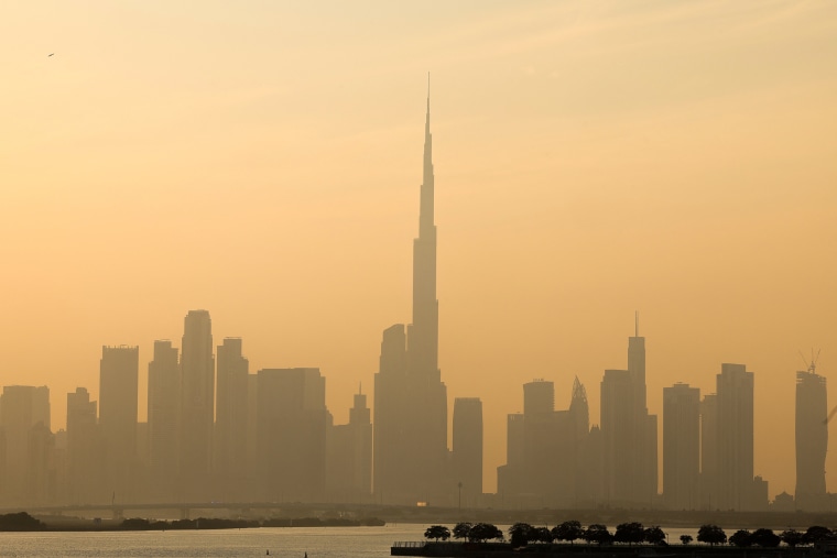 Haze obscures the Dubai skyline, including Burj Khalifa, the world's tallest building, on Monday.