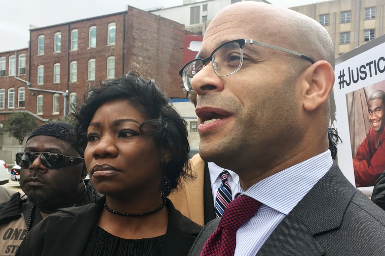 Monteria Robinson, Jamarion Robinson's mother, with her lawyer, Andrew M. Stroth, outside the federal courthouse in Atlanta in 2018.