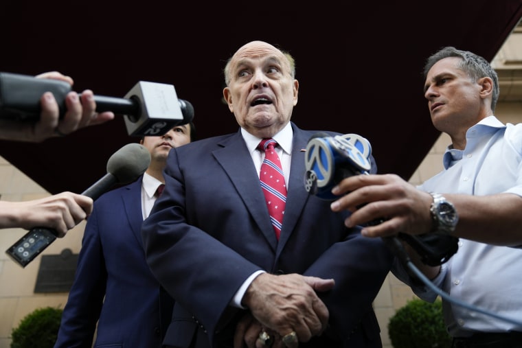Image: Rudy Giuliani speaks to reporters