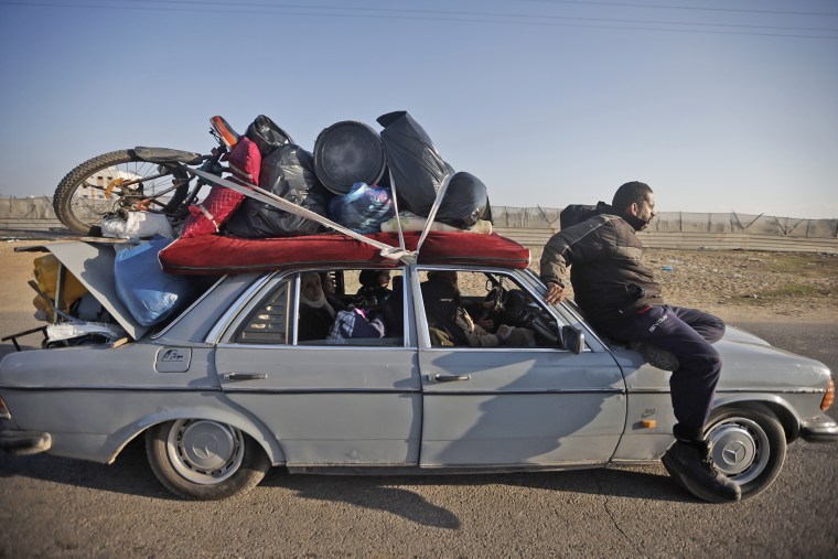 Palestinians flee the Israeli ground offensive in Khan Younis, Gaza Strip, on Dec. 6, 2023. 