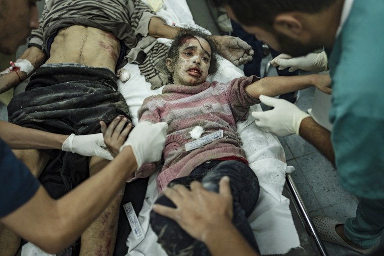 Wounded Palestinians arrive at a hospital in Rafah on Wednesday, Dec. 6, 2023. 