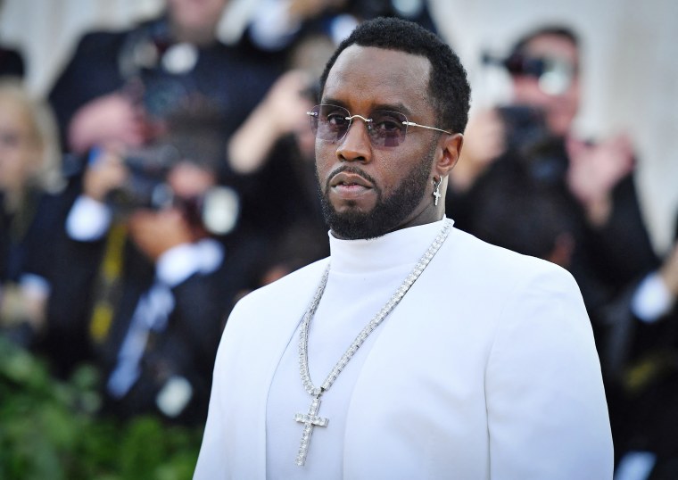 Sean Combs arrives at the 2018 Met Gala.