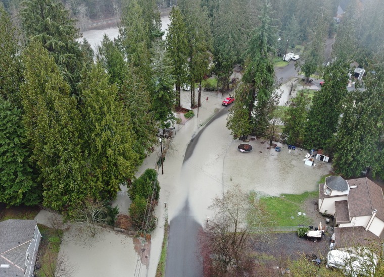 Floodwaters in Snohomish County highlight heavy rains that have blanketed parts of the Pacific Northwest.