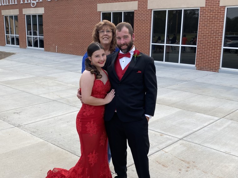 Jonathan David Hankins with his mother, Gretchen Hankins, and daughter, Brooke.