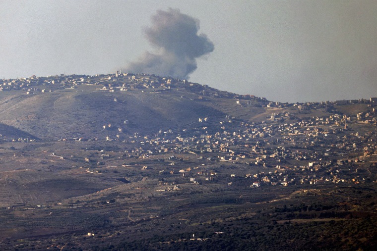 Smoke from an Israeli bombardment billows across the horizon along the hills in southern Lebanon on Dec. 10, 2023.