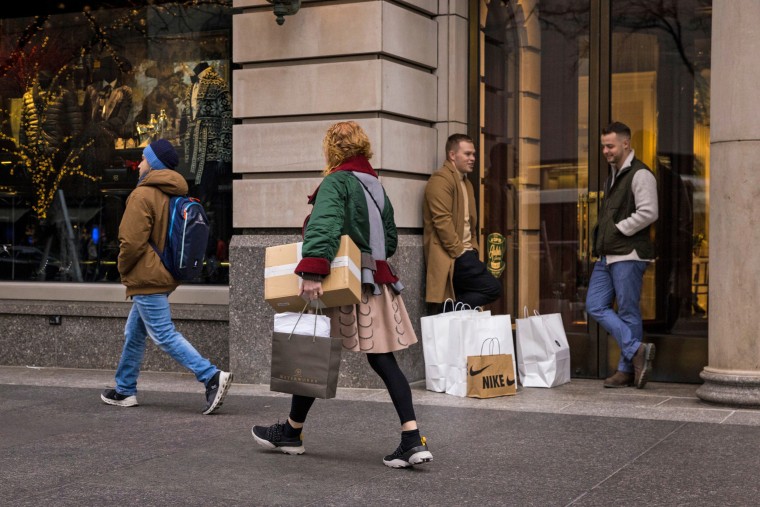 Shoppers in the Magnificent Mile shopping district of Chicago on Dec. 2, 2023.