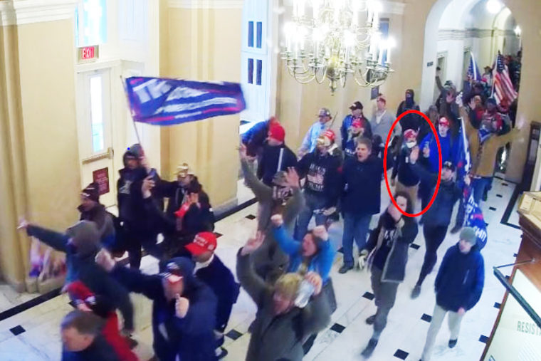 Paul Caloia, circled in red, inside the Capitol.