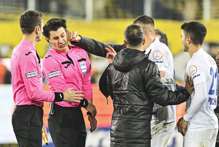 Turkey suspends all league games after club president punches referee at a top-flight match.